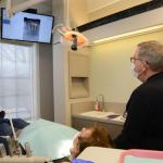 Dr. Gardner and patient in exam room