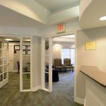 Office photo of reception area view of an exam room