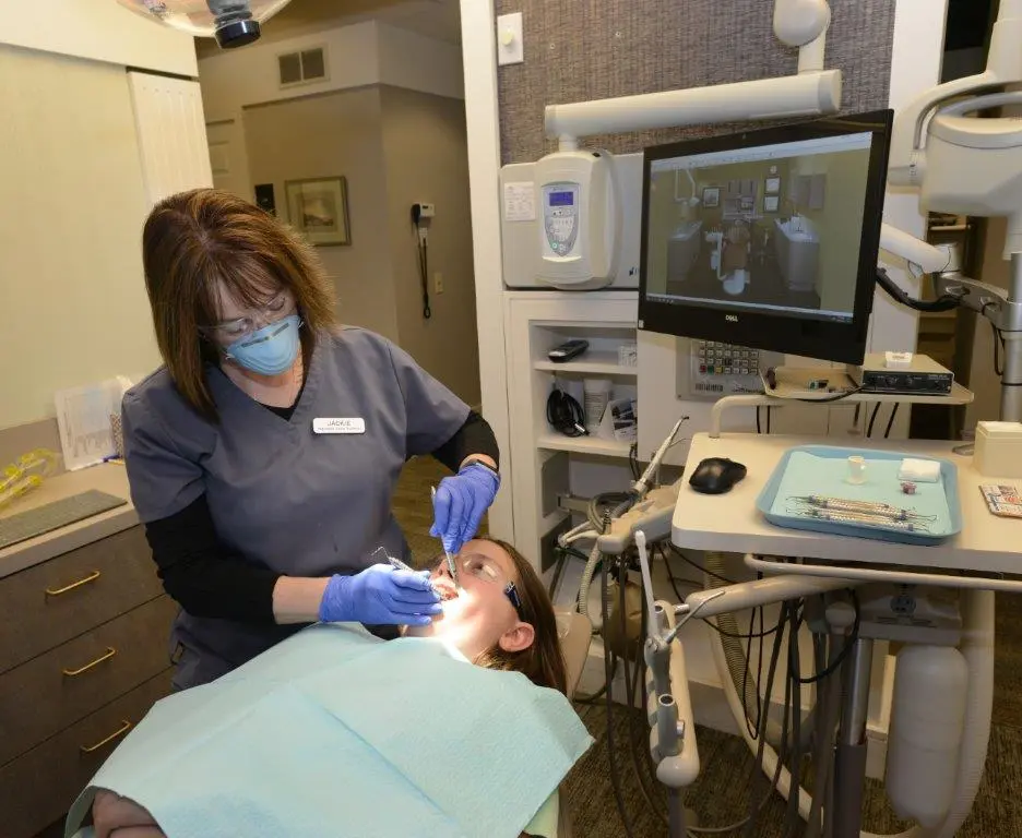 Photo of staff working on patient from a distance
